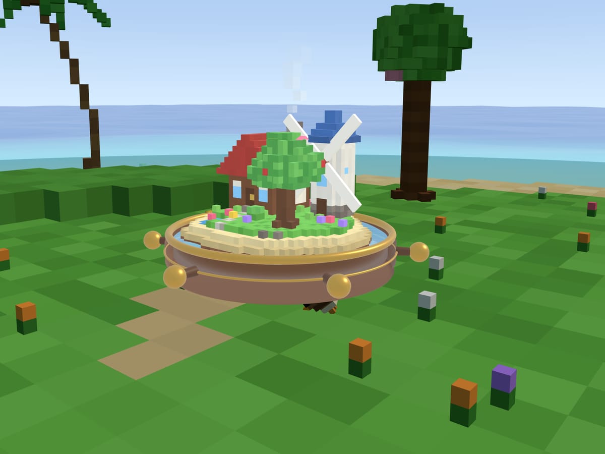 A finished Windmill Island puzzle on its round tray: a red-roofed house, a windmill and a tree on a tiny beach, with the sea and palm trees behind