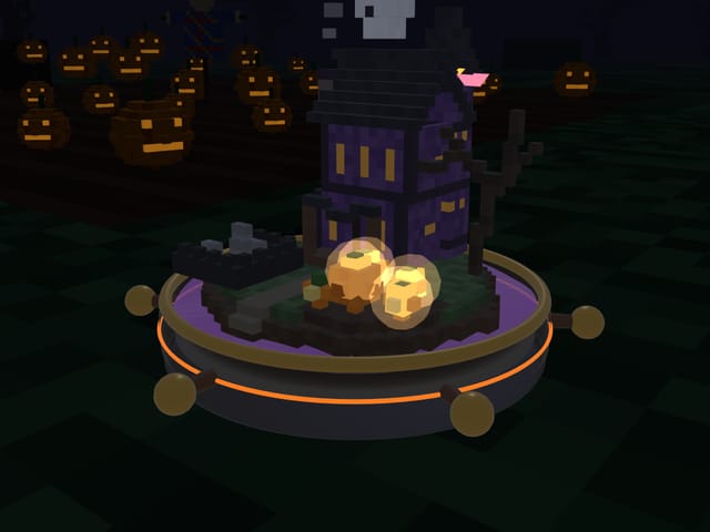 Haunted House: a purple mansion with glowing pumpkins on a dark hillside
