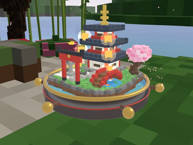 Pagoda Garden: a red pagoda, a torii gate and a cherry tree in bloom